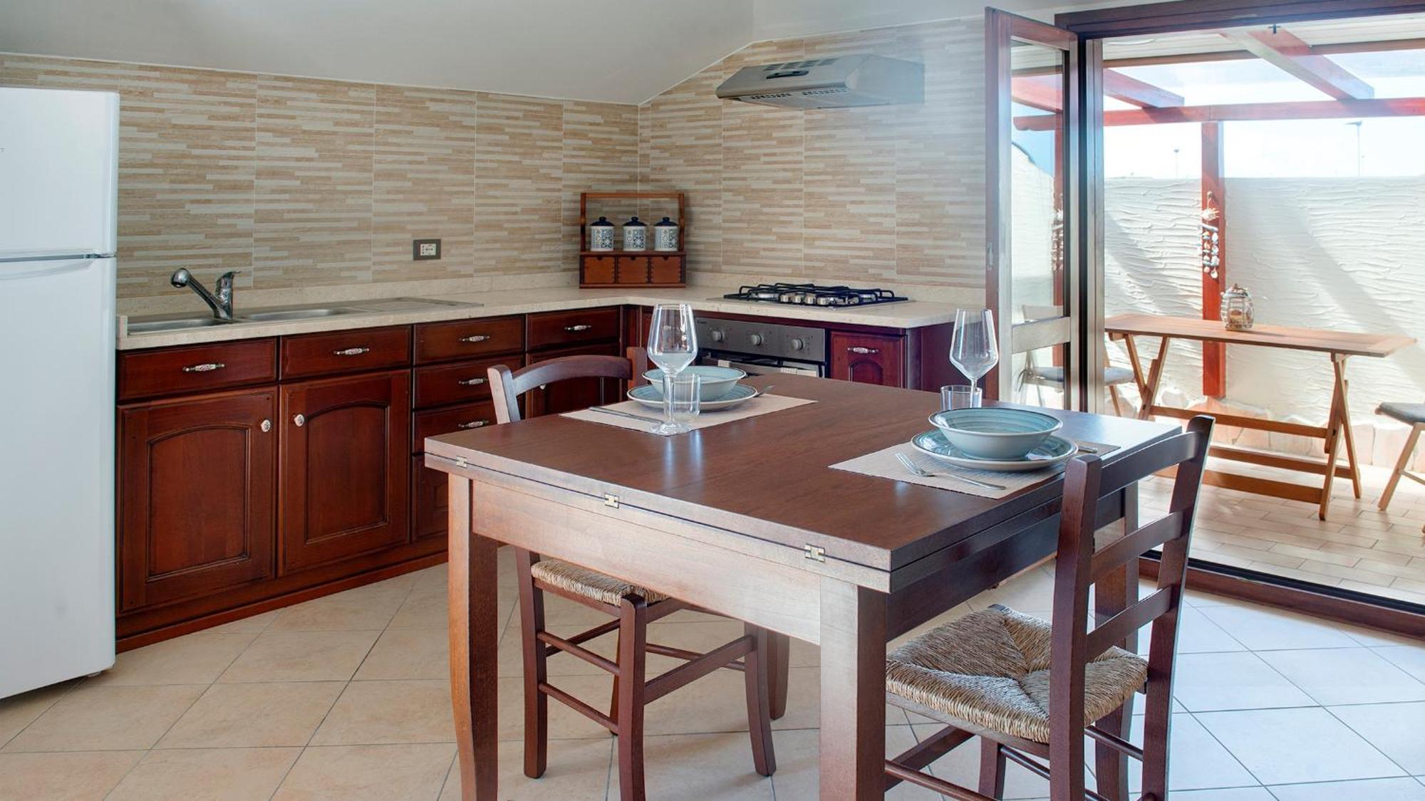 Casa Vacanze Ammentos Olmedo Buitenkant foto